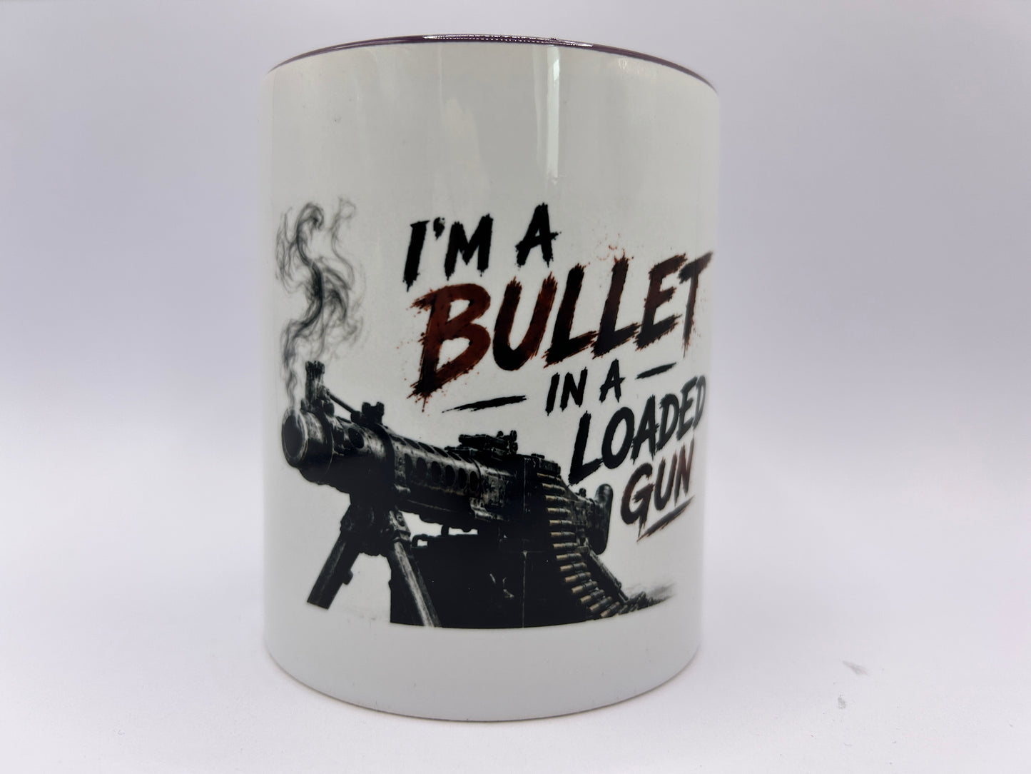 Keramiktasse mit Spruch I'm A Bullet In A Loaded Gun und düsterem Rock Design
